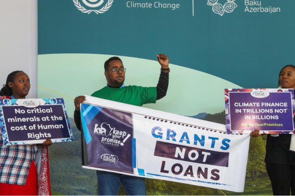 Environmental activists protest during the United Nations climate change conference COP29, in Baku, Azerbaijan November 15, 2024. | Photo Credit: Reuters